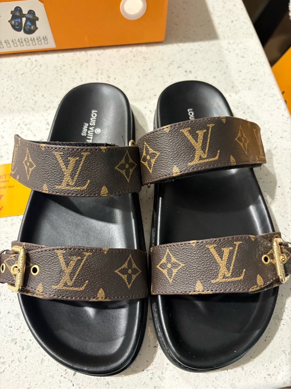 Louis Vuitton Brown Monogram Double-Strap Slides with Gold Buckles